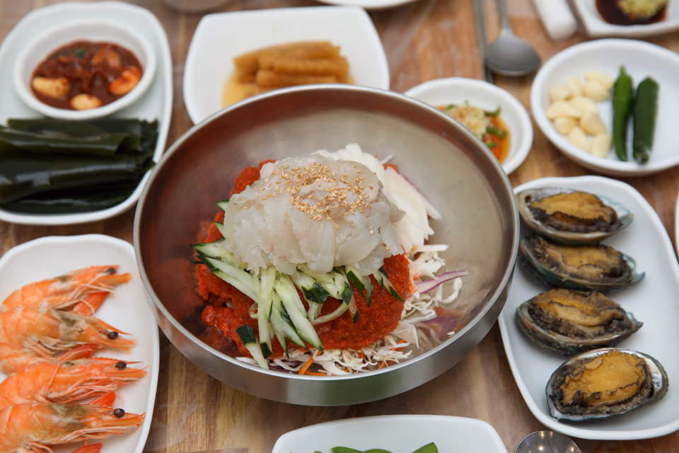 Premium mulhoe served at Sujeong Hoejib with thick-cut squid and flatfish